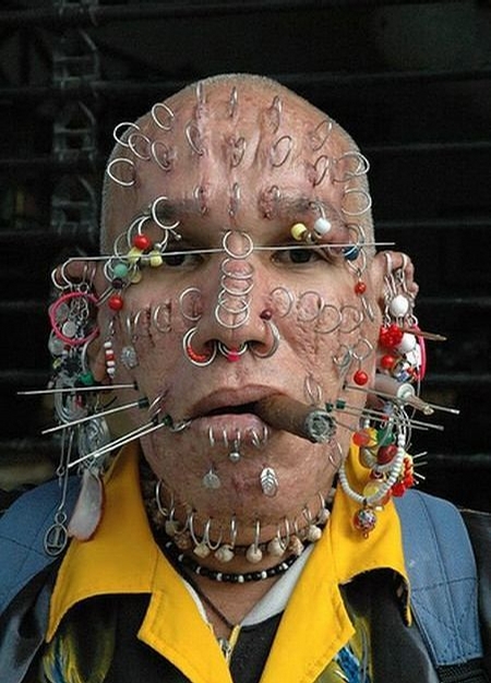 most piercings on face. stupid people disfigurement body sexy lol stupid people with piercings
