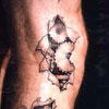cool tattoo on the leg