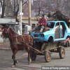 Cart carrying a blue automobile images funny