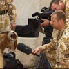 soldiers are interviewing one of the terrorists