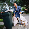 Funny pictures images celebrity posing in pyjamas at a garbage bins