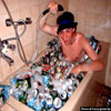 Fun pictures young guy having beer foam bath