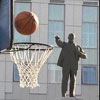 Lenin scores his 3 point basketball