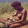 Native woman feeding a strange hungry baby funny animal pictures