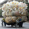 Check out what can fit onto a bike - massiv load of pet bottles funny