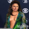 Cute shemale George in a pretty green dress funny celebrity pictures