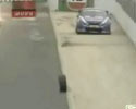 racing car loses tyre during race video.