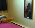 a dumb cat almost catch itself in the mirror