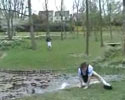 funny video of a kid trying to jump over the pond