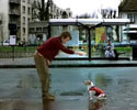 hilarious umbro ad. Guy kicks dog near bus stop.