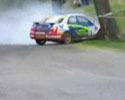 racing car crashing into tree cutting in the half.