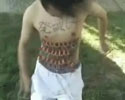 crazy suicide bomber fires crackers on his body.