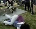 two girls fist fighting. Several punches & kicks landed