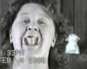 an old woman rotates her denture in her mouth