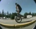 movie of skilled biker shows some tricks on unicycle