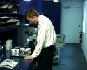worker pisses in his boss cup. He must love his boss