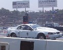 watch police car attending drag racing competition