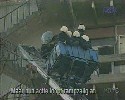 gang of policemen fall down from high-lift truck