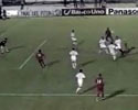 soccer player scores over-head goal