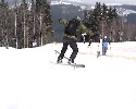 snowboarder tries to slide down the ramp .. ouch